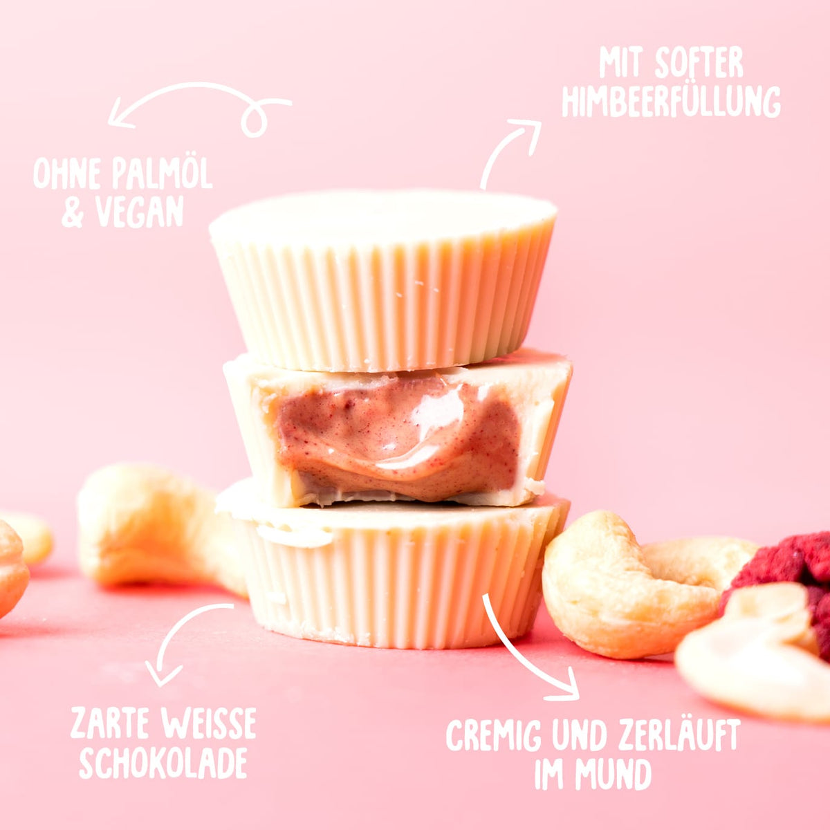 Bio Cashew Butter Cups Raspberry Rumble, gestapelt mit Himbeerfüllung, Cashewkernen und Himbeeren